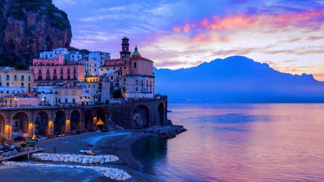 The town of Atrani offers spectacular sunrises and dramatic skies in this seaside town full of cafes, bars and trattoria